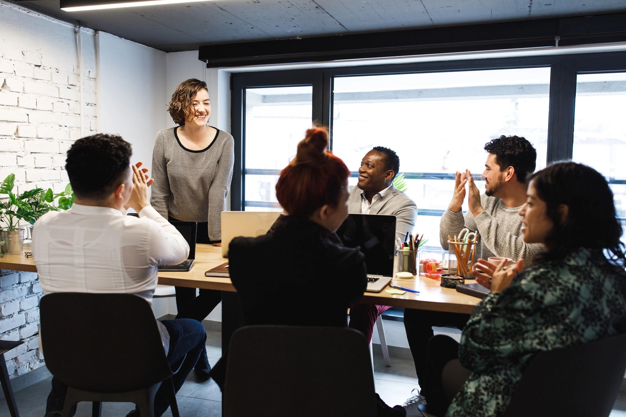 Software team meeting in a modern conference room